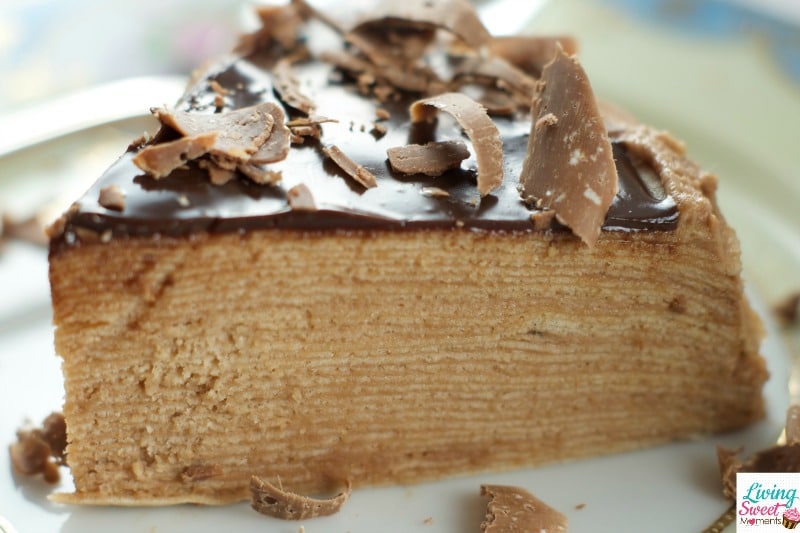 Toblerone Chocolate Crepe Cake - 30 crepes layered with Toblerone ganache and topped with a dark chocolate glaze. A simple, delicious and beautiful cake for entertaining. 