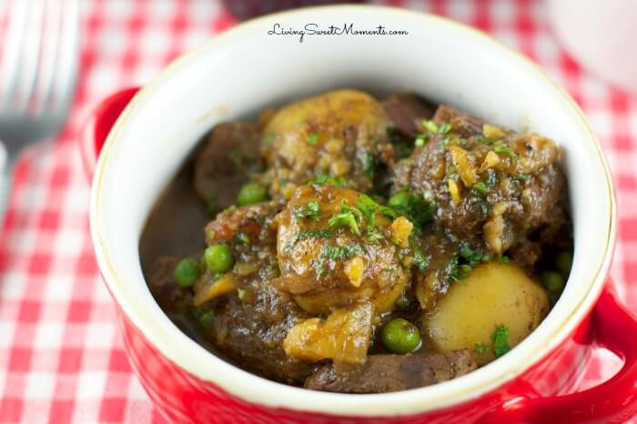 Guinness Beef Stew - Slow cooker beef stew made with beef and hearty veggies served with a delicious Guinness Beer sauce. Perfect irish stew recipe.