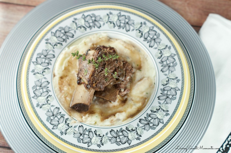 Slow Cooker Short Ribs - Made with red wine and delightful herbs. This delicious dish falls off the bone creating tender flavorful beef that requires very little prep.