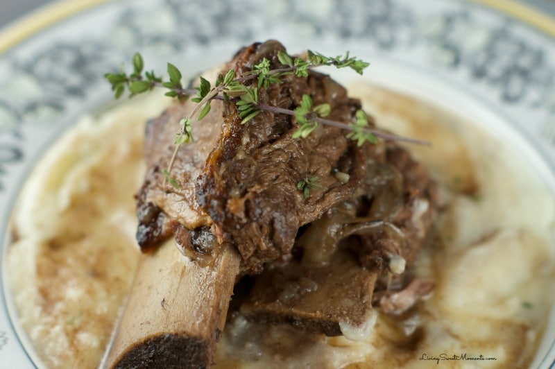 Slow Cooker Short Ribs - Made with red wine and delightful herbs. This delicious dish falls off the bone creating tender flavorful beef that requires very little prep.