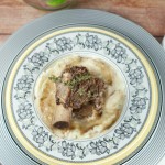 Slow Cooker Short Ribs - Made with red wine and delightful herbs. This delicious dish falls off the bone creating tender flavorful beef that requires very little prep.