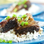 asian style short ribs - made in the slow cooker. Super easy to prepare and a delicious weeknight dinner recipe. The short ribs are fall off the bone tender