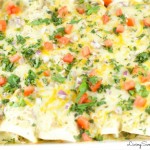 Easy Salsa Verde Chicken Enchiladas - Delicious creamy chicken enchiladas baked with a delicious salsa verde sauce. I used store bought chicken to save time