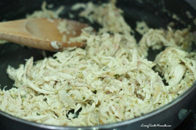 Easy Salsa Verde Chicken Enchiladas - Delicious creamy chicken enchiladas baked with a delicious salsa verde sauce. I used store bought chicken to save time