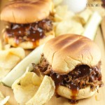 Slow Cooker Pulled BBQ Beef Sandwiches: delicious and tender beef slow cooked in a homemade BBQ sauce served on a toasted hamburger bun. Perfect for parties