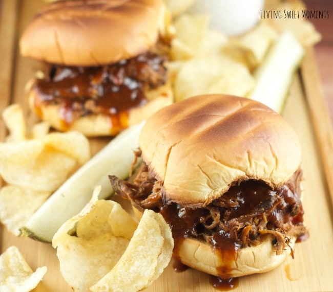 Slow Cooker Pulled BBQ Beef Sandwiches: delicious and tender beef slow cooked in a homemade BBQ sauce served on a toasted hamburger bun. Perfect for parties