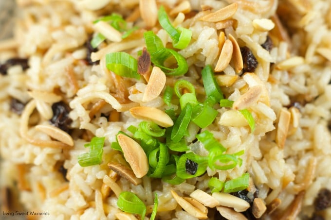 Coca Cola Rice Recipe : This delicious latin rice made with coca cola is topped with raisins and toasted almonds. Great and easy side dish to any meal. Yum!