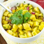 Mango Salad - Just 4 ingredients, this mango salad is the perfect summer recipe for the outdoors. Easy to make and delicious. Serve it as an app or w/chips.