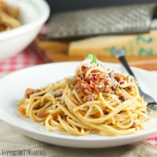Spaghetti with San Marzano Tomato And Meat Sauce - Delicious & easy to make Spaghetti with meat sauce is the perfect quick weeknight dinner idea with ground beef!