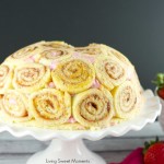 Strawberry Charlotte Royale Cake - This amazing strawberry cake is easy, delicious and beautiful. Jelly roll slices are filled with Berry Bavarian Cream.