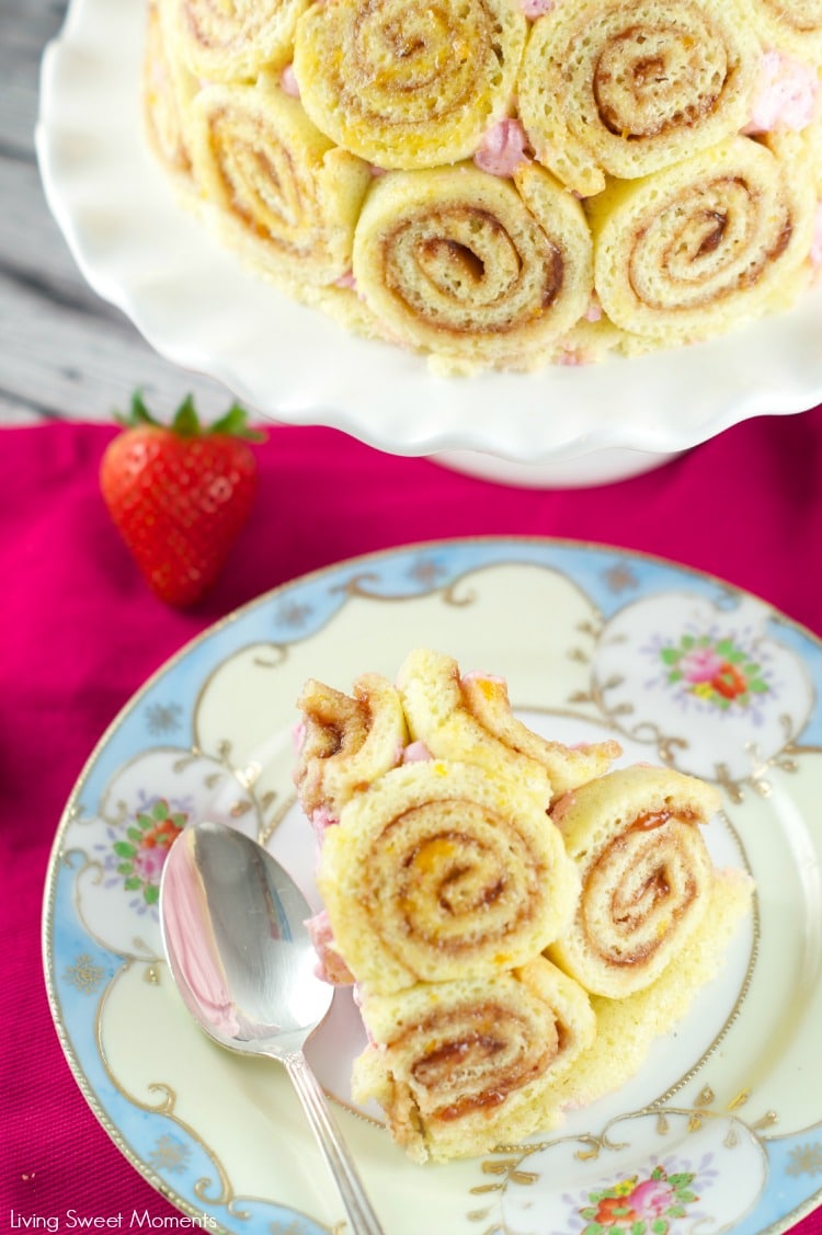 Strawberry Charlotte Royale Cake - This amazing strawberry cake is easy, delicious and beautiful. Jelly roll slices are filled with Berry Bavarian Cream. 