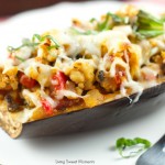 Turkey Stuffed Eggplant - Delicious lean turkey mixed with veggies and tomato sauce serve inside roasted eggplants and topped with cheese. Yummy lean recipe