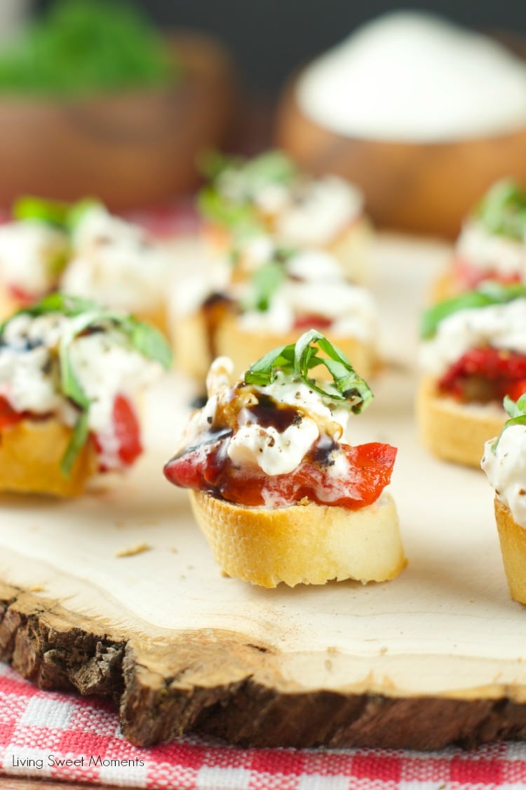 Roasted Red Pepper Burrata Crostini - crispy baguette slices are topped with roasted red peppers, creamy burrata, basil and a splash of balsamic glaze.