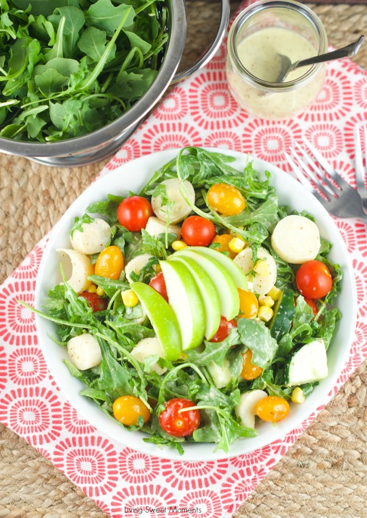 Apple And Tomato Arugula Salad: delicious summer salad with tomatoes, arugula, corn, apple and hearts of palm tossed with a homemade Mustard Vinaigrette.