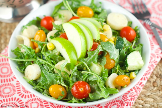 Apple And Tomato Arugula Salad: delicious summer salad with tomatoes, arugula, corn, apple and hearts of palm tossed with a homemade Mustard Vinaigrette.