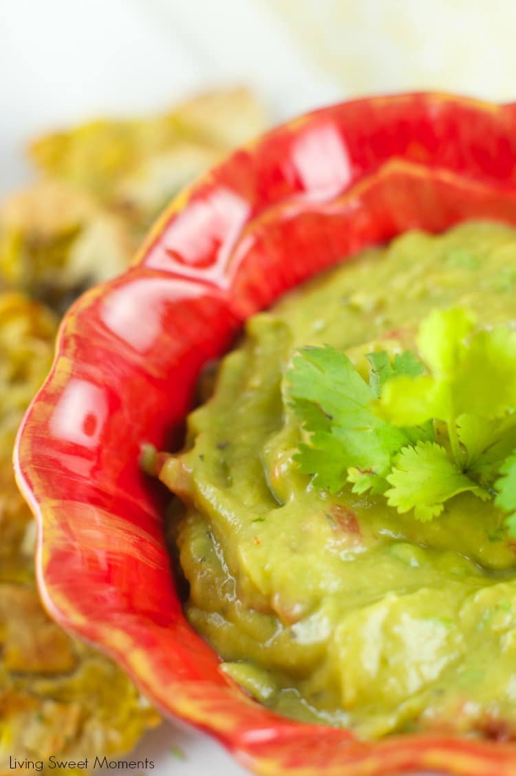 Baked Tostones With Guasacaca Sauce Recipe: easy plantains are crispy baked and served with a Venezuelan avocado dip that's perfect as a dinner side dish.