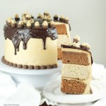 Chocolate Peanut Butter Cheesecake Cake - This is amazing cake features 2 chocolate cakes, a peanut butter cheesecake all covered in peanut butter buttercream and drizzled with chocolate ganache. The ultimate dessert. Find more at www.livingsweetmoments.com