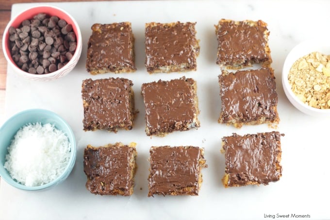 Hello Dolly Bars: these magic bars are made a graham cracker crust, chocolate chips, walnuts, cereal, coconut and more. Perfect dessert for any holiday or get together!