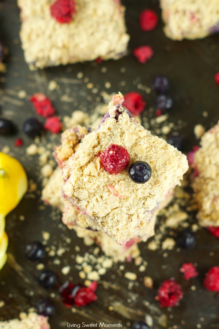 Lemon Creme Crumb Bars: Crumbly butter oatmeal crust with a citrus berry creme filling. These bars are the perfect summer dessert for any occasion