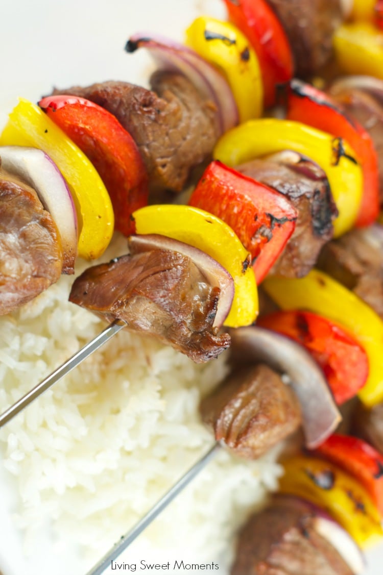 Marinated Beef Kabobs Recipe: delicious grilled beef and veggies served over a bed of rice. Perfect quick dinner idea for a weeknight or a get together.