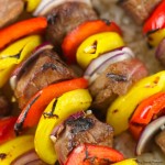 MarinaMarinated Beef Kabobs Recipe: delicious grilled beef and veggies served over a bed of rice. Perfect quick dinner idea for a weeknight or a get together.ted Beef Kabobs Recipe: delicious grilled beef and veggies served over a bed of rice. Perfect quick dinner idea for a weeknight or a get together.