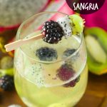 Tropical Moscato Sangria: delicious bubbly moscato with chunks of kiwi, dragon fruit and blackberries. The perfect summer cocktail drink for summer parties.