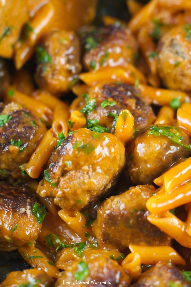 One Pan Pasta And Meatballs: the perfect one pot meal dinner idea! Tender homemade meatballs are cooked inside a tomato basil sauce served with penne pasta.