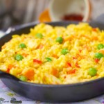 Arroz Con Pollo: Delicious latin dish made with chicken breast, veggies and saffron. Comes together in minutes and is perfect for a one pot weeknight dinner.