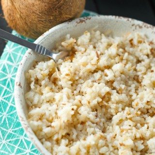 Colombian Coconut Rice: this latin rice is bursting with flavor and texture. A sweet and salty side dish that is ready in minutes. Perfect for weeknight dinners and entertaining too.