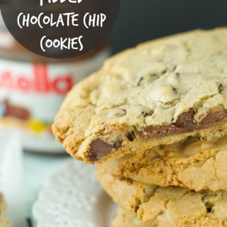 Nutella Stuffed Chocolate Chip Cookies - chewy chocolate chips cookies are filled with creamy Nutella. The perfect indulgent dessert for kids and adults. More on www.livingsweetmoments.com