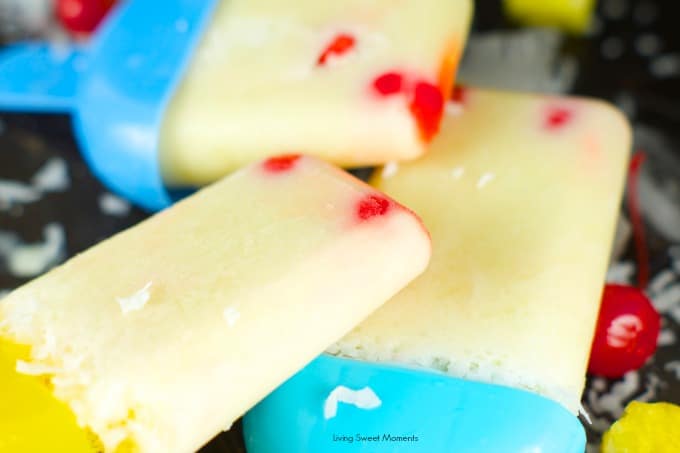 Pina Colada Popsicles - only 4 ingredients needed to make this delicious frozen treat. Enjoy the delicious flavor of your favorite virgin cocktail in a fun way