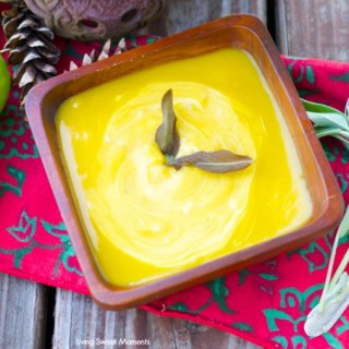 Roasted Butternut Squash And Apple Soup - amazing recipe for the fall. Roasted butternut squash soup is mixed with sage & curry and topped with fried sage