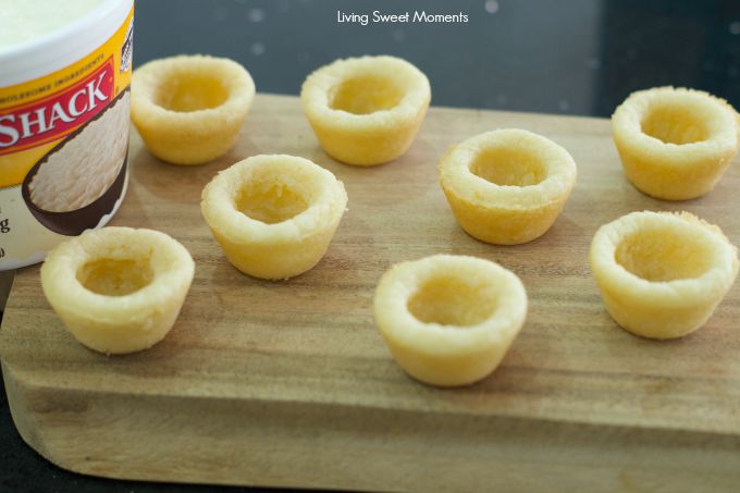 Bananas Foster Cookie Cups- chewy cookie cups filled with rice pudding and topped with homemade bananas foster. An easy to make dessert for any occasion