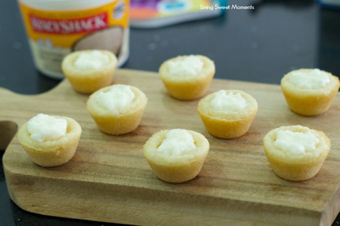 Bananas Foster Cookie Cups- chewy cookie cups filled with rice pudding and topped with homemade bananas foster. An easy to make dessert for any occasion