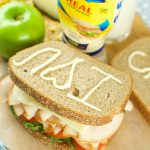 Kid Friendly Turkey Sandwich - loaded with meat, veggies, jelly and mayo for an delicious and healthy lunchbox item. Plus a great idea to send notes to kids