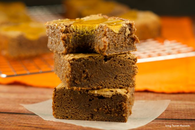 Pumpkin Cheesecake Brownies: this easy and delicious recipe is perfect for fall and winter. Brownies and fudgey with a creamy spiced pumpkin cheesecake top. 