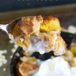 Skillet Peach Cobbler: This easy dessert recipe is delicious, easy and whips up in minutes. Peaches are cooked first on the stove and then baked in the oven