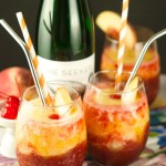 Riesling Peach And Cherry Slushies: delicious frozen cocktail with wine, cherries and peaches. Perfect to enjoy poolside or for entertaining. Refreshing!