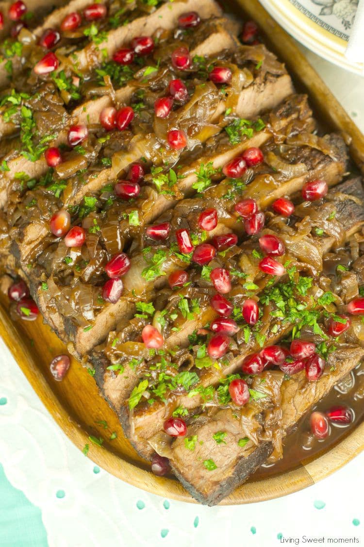 Wine And Pomegranate Brisket Recipe: delicious braised brisket with a pomegranate and wine sauce. Perfect & easy beef dinner for parties and entertaining. 