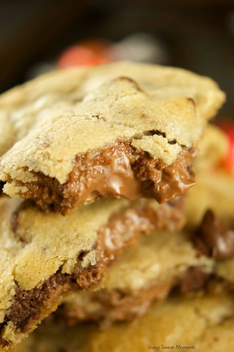 Truffle Stuffed Chocolate Chip Cookies - these chewy chocolate chip cookies are ooey gooey and stuffed with a chocolate truffle. The best cookie recipe! Yum