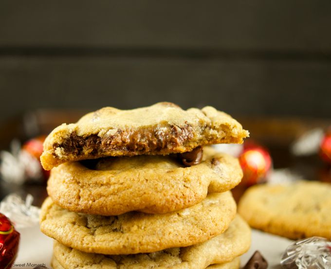 Truffle Stuffed Chocolate Chip Cookies - these chewy chocolate chip cookies are ooey gooey and stuffed with a chocolate truffle. The best cookie recipe! Yum