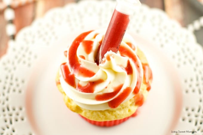 Bloody Cupcakes - the perfect Halloween Treat for a party! Vanilla cupcakes with vanilla buttercream filled with strawberry coulis. Decadent and original!