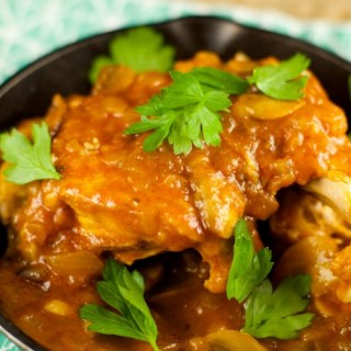 Braised Chicken And Mushrooms Recipe - this delicious one pot chicken recipe is easy to make and perfect for a weeknight dinner. Served with a yummy sauce.
