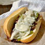 Easy Philly Cheese Steak Sandwich Recipe - this easy weeknight dinner idea is made in no time and has so much flavor! Enjoy authentic flavor in one bite.