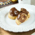 This Ferrero stuffed hazelnut cookies are topped with melted chocolate. The perfect crispy cookie recipe that will wow a crowd. Best dessert ever! Yum