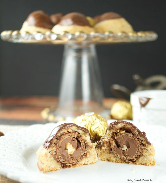 This Ferrero stuffed hazelnut cookies are topped with melted chocolate. The perfect crispy cookie recipe that will wow a crowd. Best dessert ever! Yum