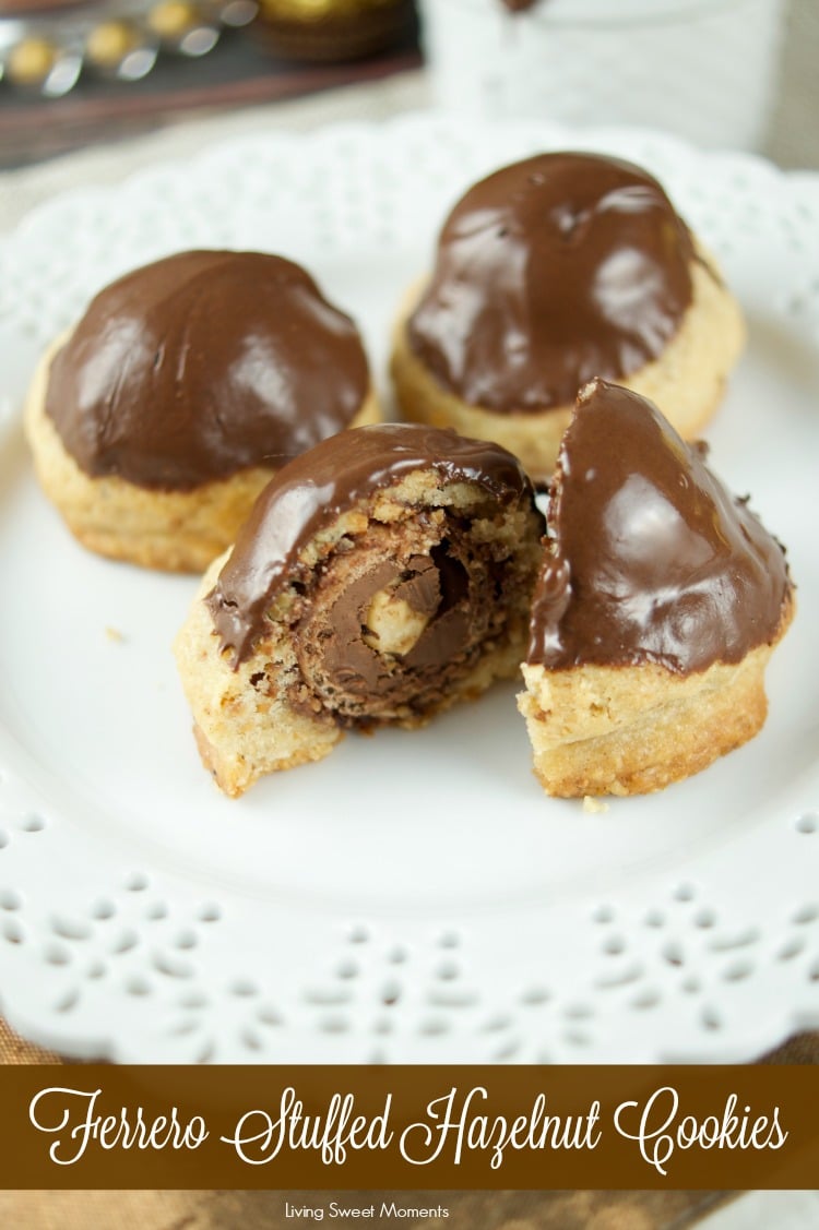 This Ferrero stuffed hazelnut cookies are topped with melted chocolate. The perfect crispy cookie recipe that will wow a crowd. Best dessert ever! Yum 