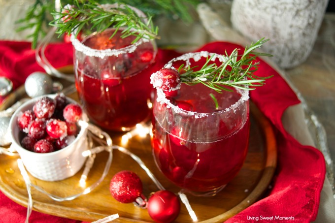 This delicious Holiday Cranberry Mocktail is infused with rosemary and cranberry syrup. Topped with a fizzy lime soda! The perfect drink for Holiday parties