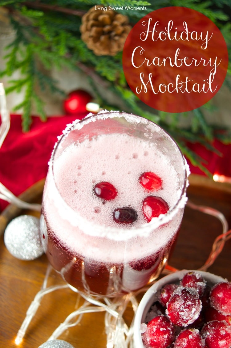 This delicious Holiday Cranberry Mocktail is infused with rosemary and cranberry syrup. Topped with a fizzy lime soda! The perfect drink for Holiday parties