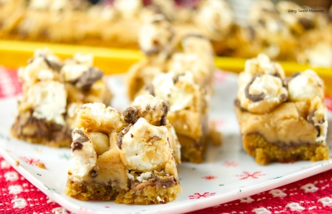 These delicious popcorn bars has a chewy peanut butter cookie crust and is topped with salted caramel fudge popcorn. The perfect dessert for kids & parties